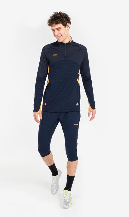 Immagine prodotto Kipsta Calcio donna/uomo 1/2 Zip - CLR blu navy/arancio (M)