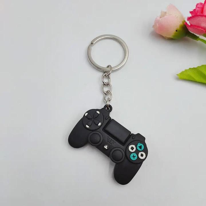 Actual product image JTI Key fob with video game console