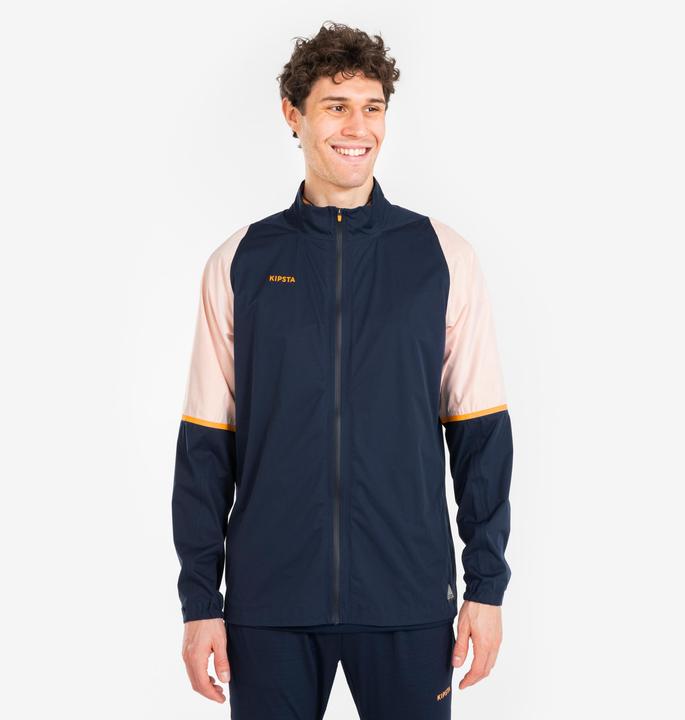 Kipsta Damen/Herren Fussball Regenjacke - CLR marineblau/orange