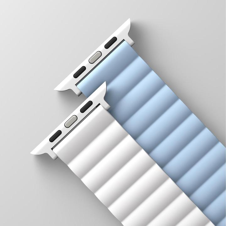Actual product image Uniq pasek Revix Apple Watch Series 1/2/3/4/5/6/7/8/SE/SE2 38/40/41mm. Reversible Magnetic biały-nie (Silicone, Stainless steel)