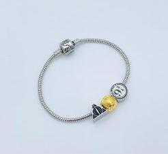 Immagine prodotto The Carat Shop Harry Potter - Bracciale con charms argentati con le reliquie della morte, Vif d'or e Voie 9