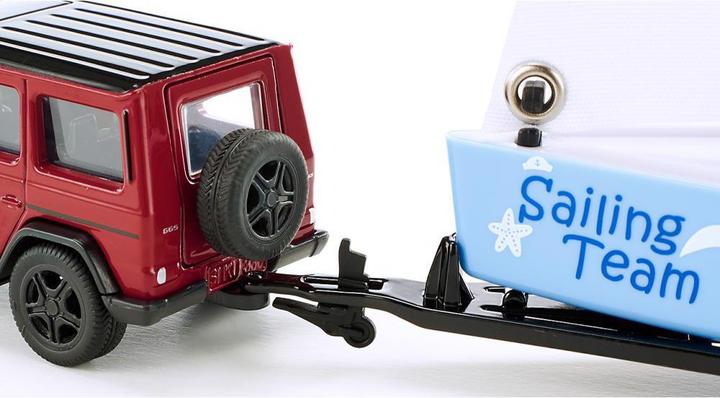 Actual product image Siku Mercedes-Benz with sailboat