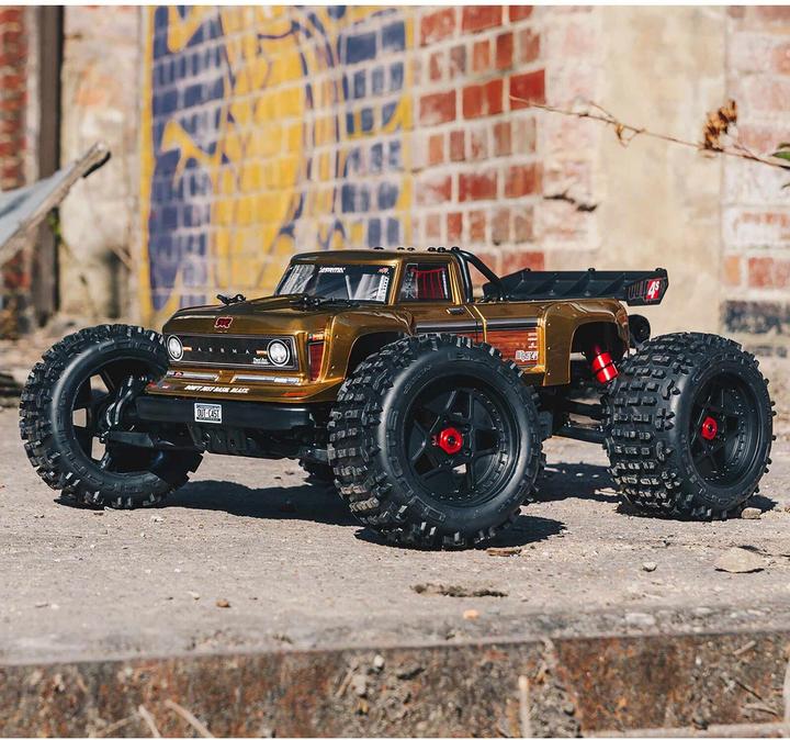 Produktbild Arrma Monster Truck Outcast 4x4 V2 BLX 4S, Bronze 1:10, ARTR (ARR Almost-Ready-to-Race)