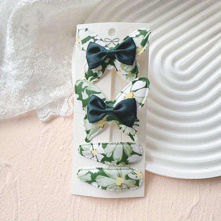 Actual product image Activity Board 4 Stück elegante Schleifen-Haarspangen - Polyester, geflochtene, florale und einfarbige Designs (4 pcs.)