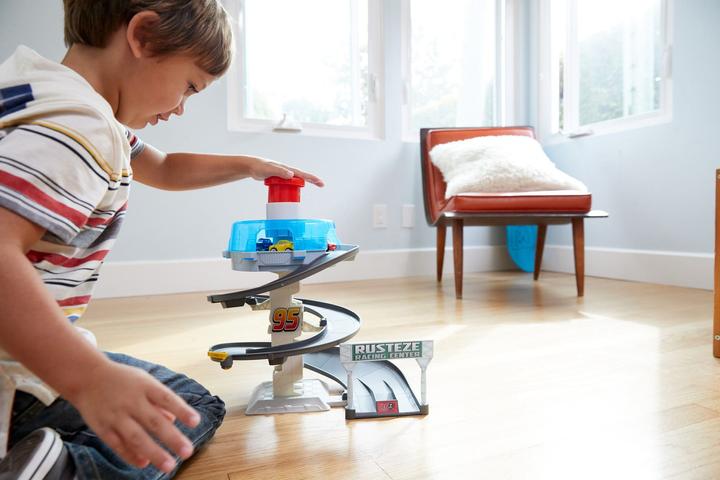 Actual product image Hot Wheels Disney Cars Rust-Eze Revolving Action Race Track Playset