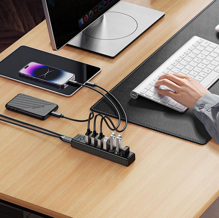 Actual product image Orico Converter PW7U-U3 hub 7x USB-A 3.0 + USB-C 5V/3A 1m - black (USB-C, 7 Ports)