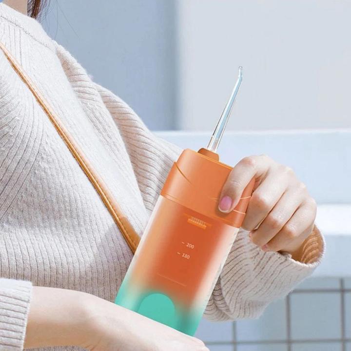 Immagine prodotto OEM Consumer electronics Electric oral irrigator 200 ml 4 tips RC-K-563 orange