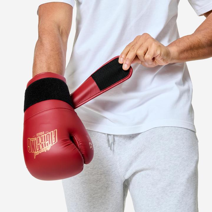 Actual product image Domyos Boxhandschuhe ergonomischer Schutz - bordeauxrot (12 OZ, 12)