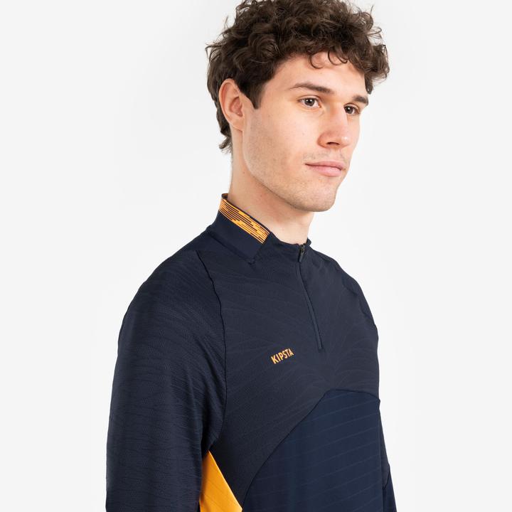 Immagine prodotto Kipsta Calcio donna/uomo 1/2 Zip - CLR blu navy/arancio (M)