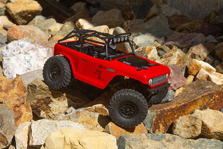 Produktbild Axial SCX24 Deadbolt Elektro Brushed Crawler 4WD 1:24 RTR rot (RTR Ready-to-Run)