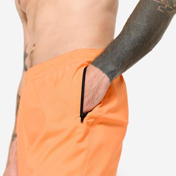 Actual product image Domyos Shorts Reissverschlusstaschen - orange (M)