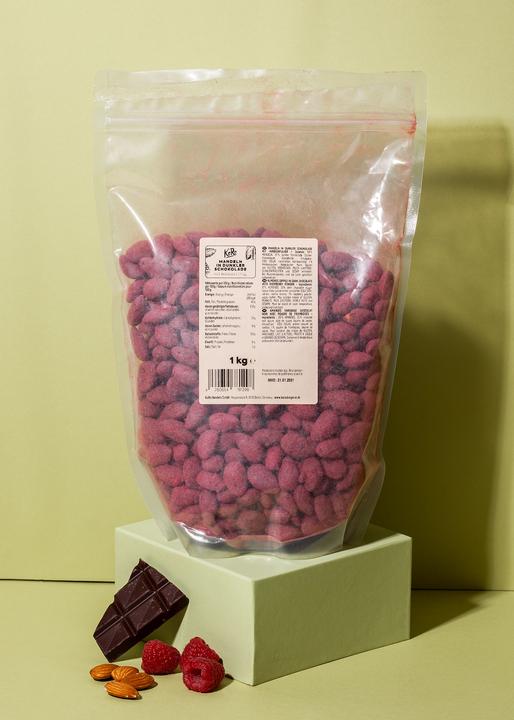 Produktbild KoRo Mandelkerne in dunkler Schokolade mit gefriergetrocknetem Himbeerpulver (1000 g)