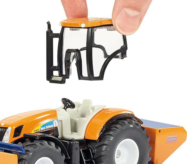 Actual product image Siku Tractor with clearing blade and spreader