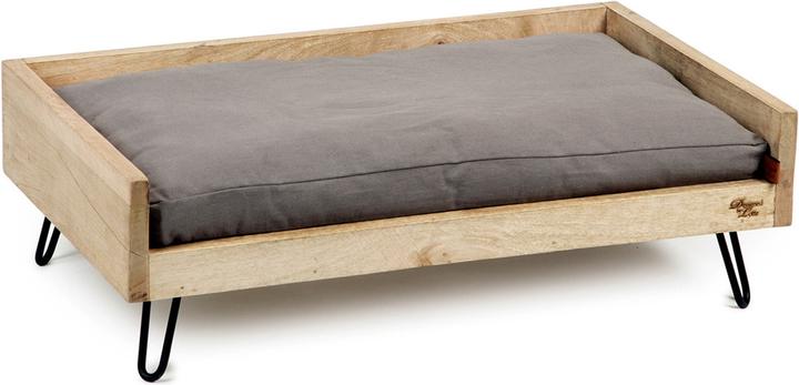Designed by Lotte Letto in legno Turana (Cane)