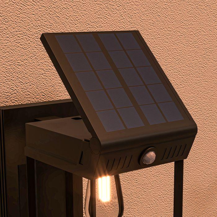 Immagine prodotto Swisshandel24 Applique solare LED luce da giardino bianco caldo sensore di luce regolabile IP44 nero (160 lm, IP44)