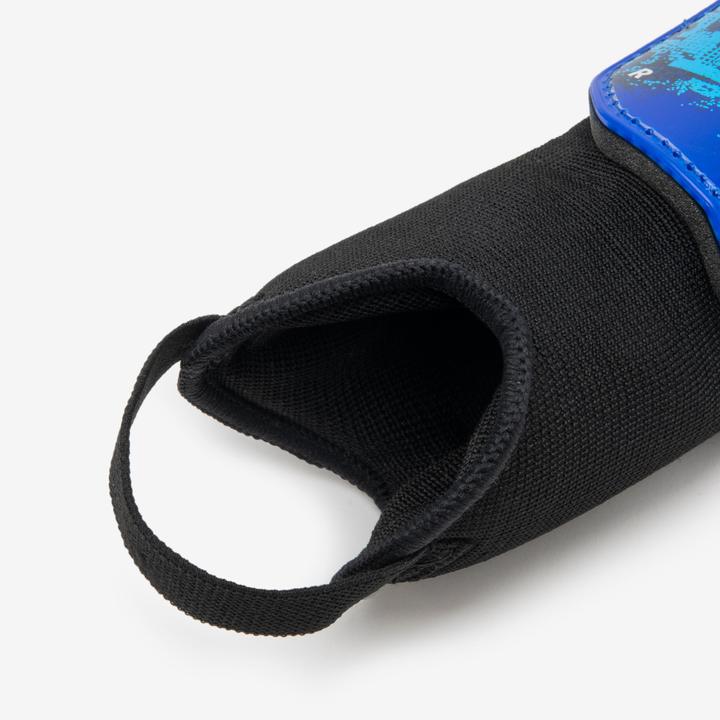 Immagine prodotto Kipsta Parastinchi da calcio per bambini - Essential 140 blu (S)