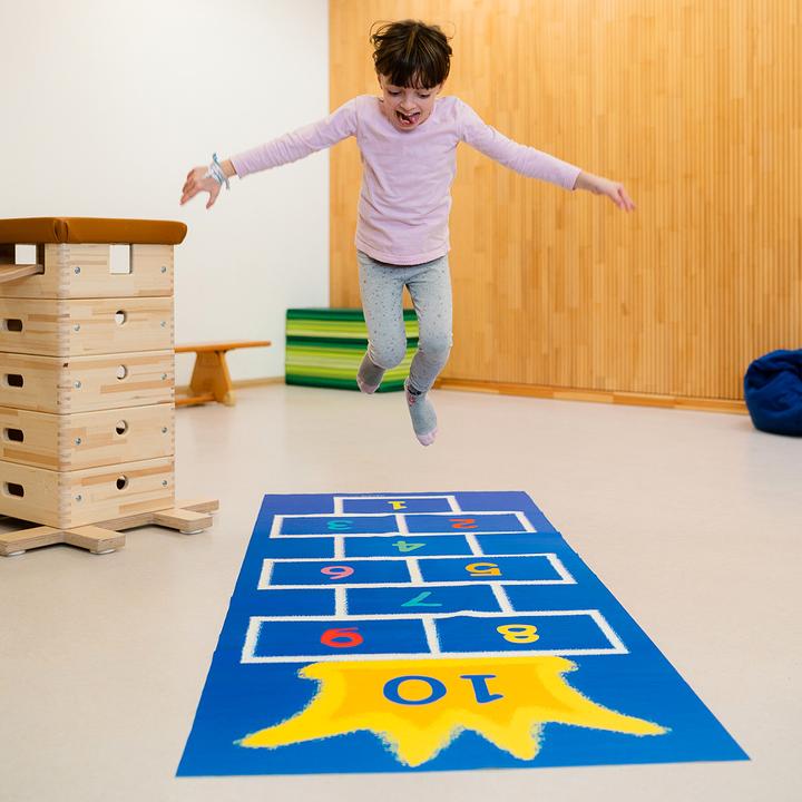 Produktbild Würfelwelt Spielteppich Hüpfkönig