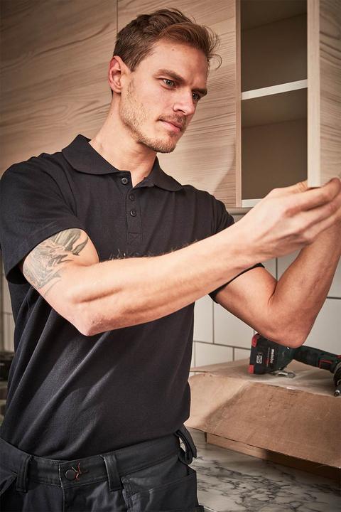 Actual product image Helly Hansen Workwear Marškinėliai HELLY HANSEN Manchester Polo, juodi M (M)