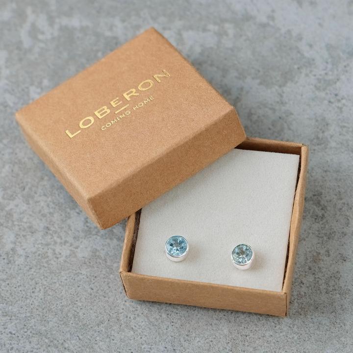 Immagine prodotto Loberon Orecchini Lilianne argento/blu (Decorazione: gemma di topazio, Orecchini: argento 925)