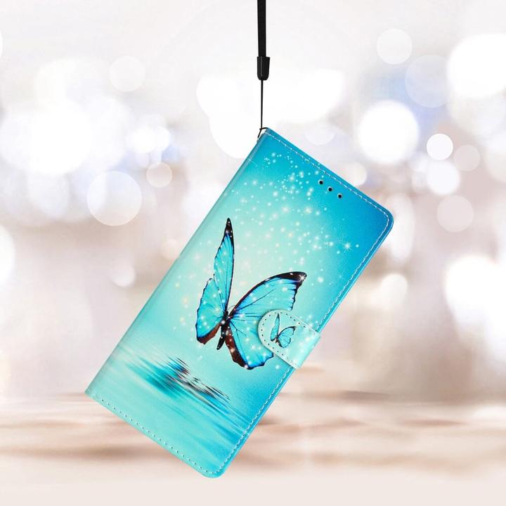 Immagine prodotto Cover-Discount Galaxy S23 FE - Custodia in pelle a farfalla blu (Samsung Galaxy S23 FE)
