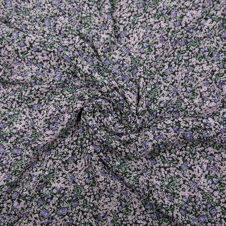 Actual product image Stoffrestposten Pleated chiffon - Purple scattered flowers on black - Minimum quantity: 1 metre