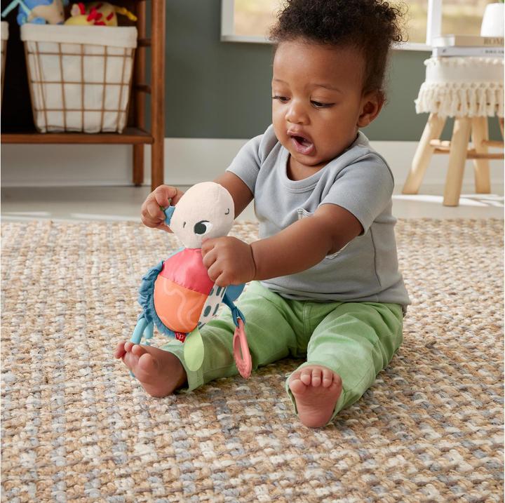 Actual product image Fisher-Price Planet Friends Fleet Turtle Pram Toy with Sensory Details for Newborns