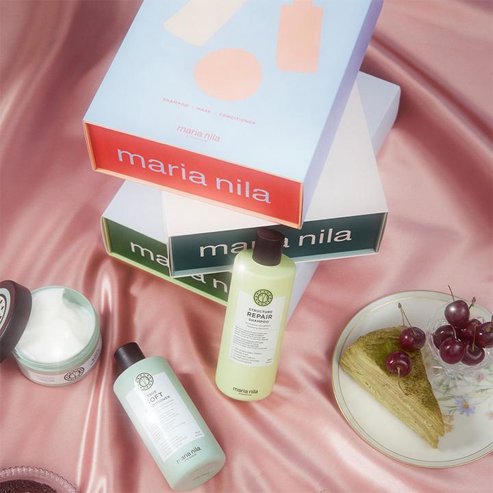 Immagine prodotto Maria Nila Scatola natalizia in argento trasparente (Set per la cura dei capelli)