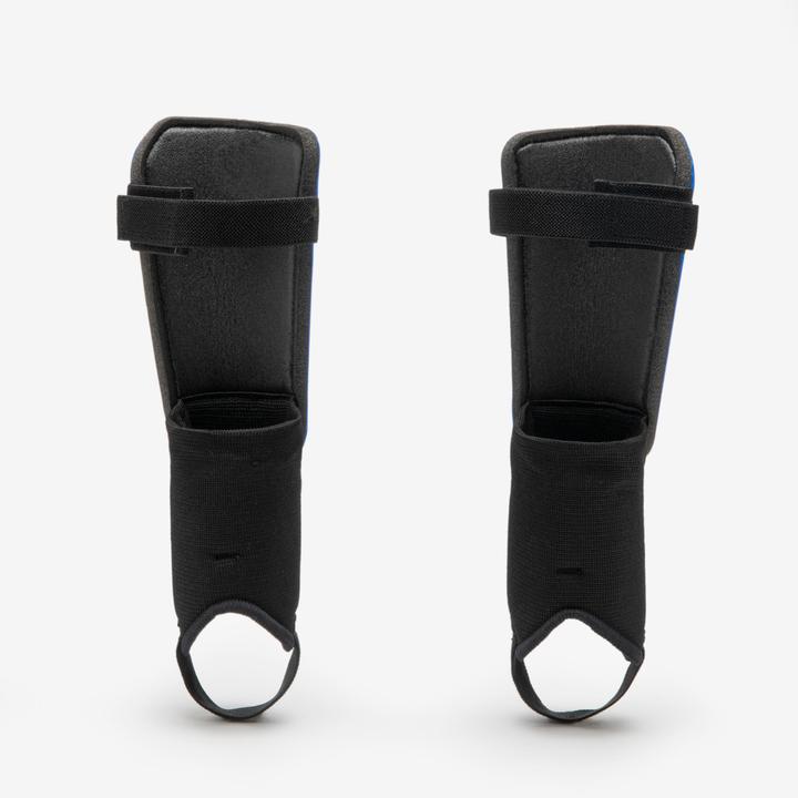 Immagine prodotto Kipsta Parastinchi da calcio per bambini - Essential 140 blu (S)