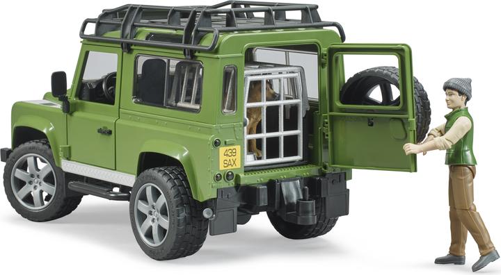 Actual product image Bruder Land Rover Defender Station Wagon with forest ranger and dog