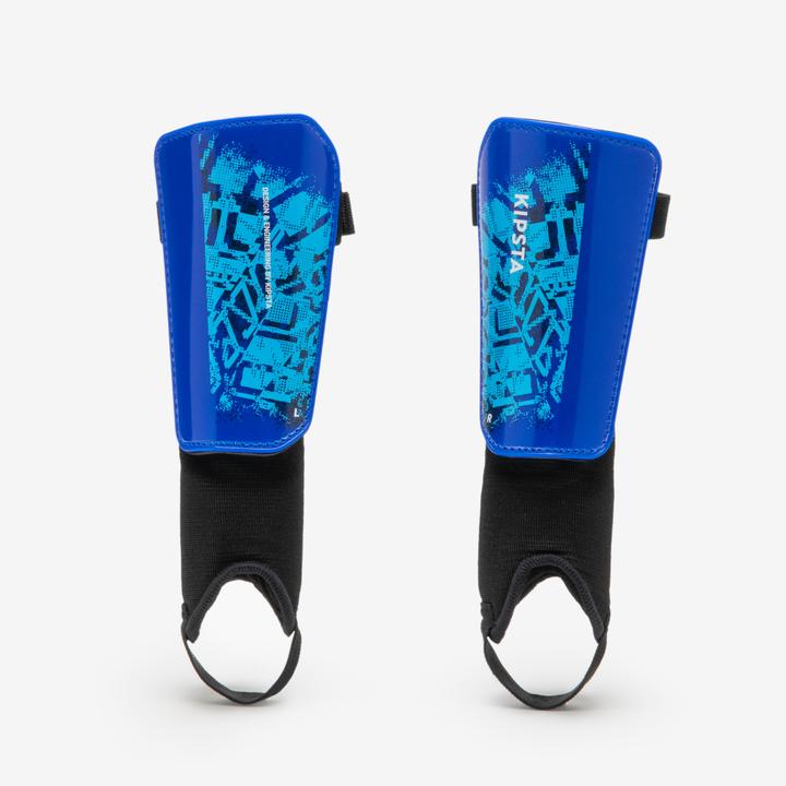 Immagine prodotto Kipsta Parastinchi da calcio per bambini - Essential 140 blu (S)