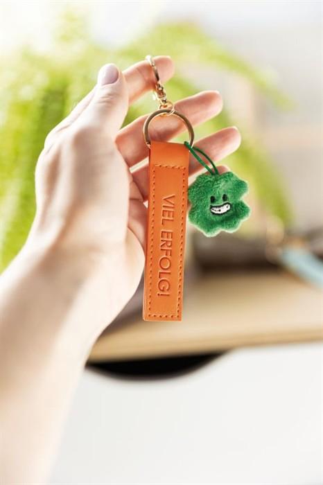 Actual product image Magni NICI Schlüsselanhänger Viel Erfolg! Kunstlederband mit Kleeblatt orange 10cm