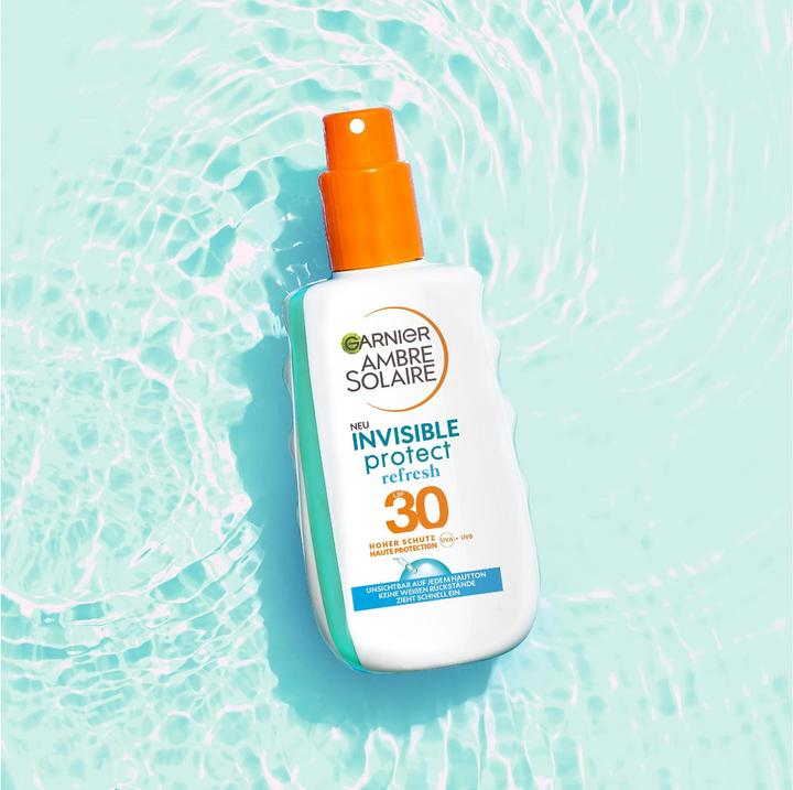 Produktbild Garnier Ambre Solaire Invisible Protect & Refresh Spray LSF 30 (Sonnenspray, SPF 30, 200 ml, 206 g)