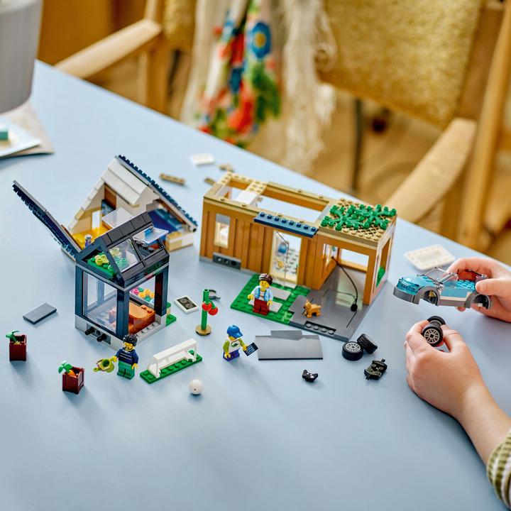 Produktbild LEGO Familienhaus mit Elektroauto (60398, LEGO City)