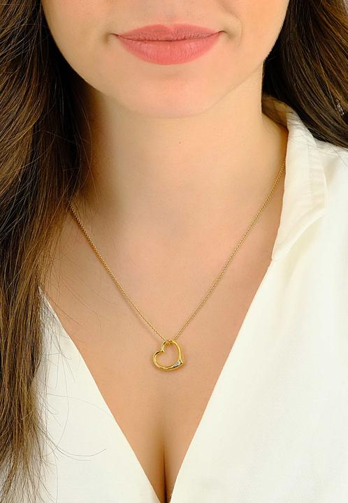 Image du produit Muau Coeur battant (750, Or blanc, Or jaune 18 carats)