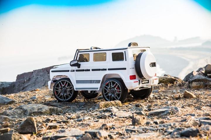 Produktbild Es-toys Kinderfahrzeug weiss - Elektro Auto "Mercedes G63 AMG" - Lizenziert - 12V7AH Akku,2 Motoren (12 V)