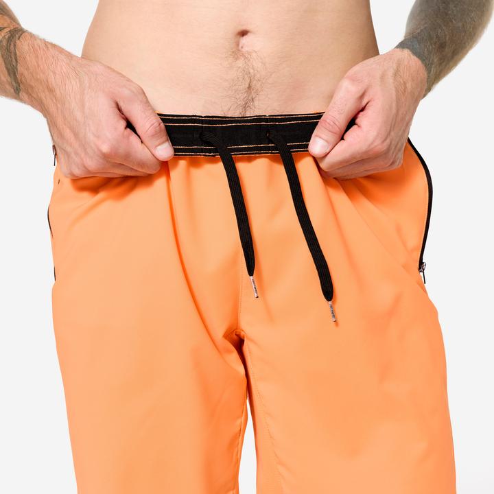Actual product image Domyos Shorts Reissverschlusstaschen - orange (M)
