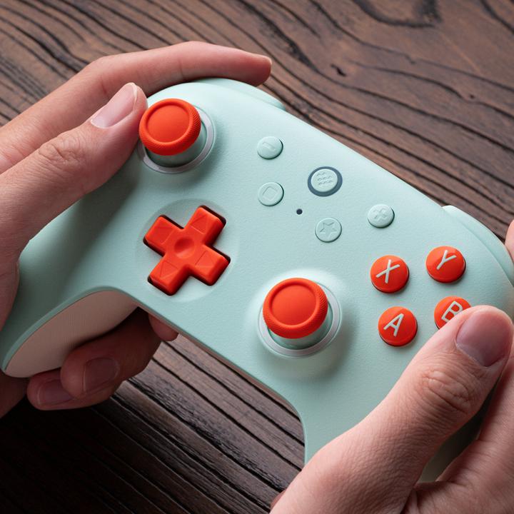 Actual product image 8bitdo Ultimate 2C Wireless (peach/light yellow, for Windows & Android) (Windows, Android)