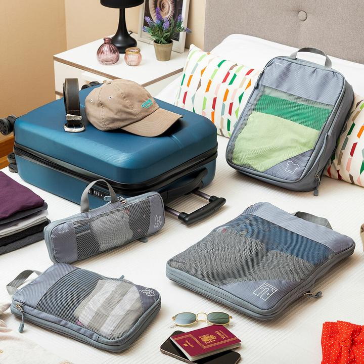 Actual product image InnovaGoods Luggage organiser bags with compression function Compakube 4 pieces (Compression stocking)