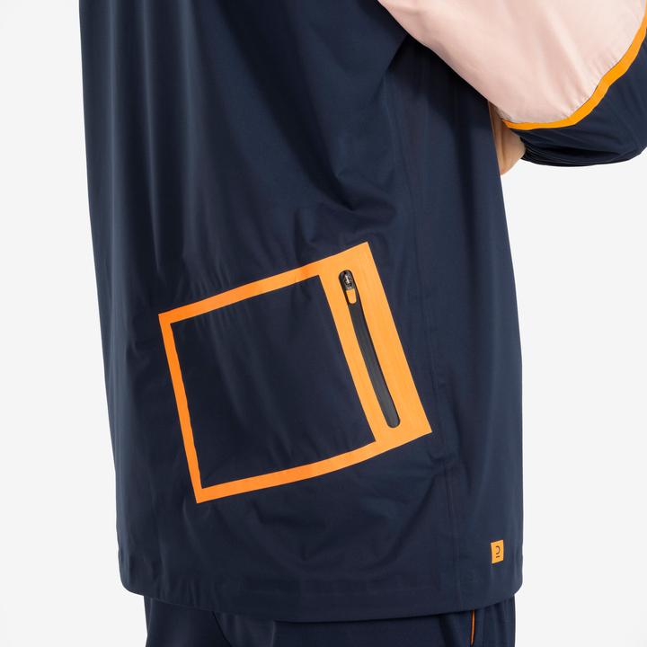 Immagine prodotto Kipsta Giacca da calcio antipioggia da donna/uomo - CLR blu navy/arancio (XS)