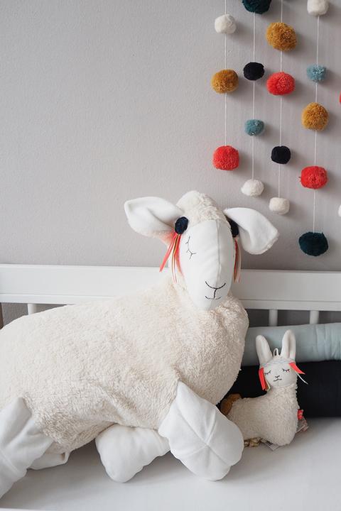 Actual product image Kikadu Cuddle cushion llama
