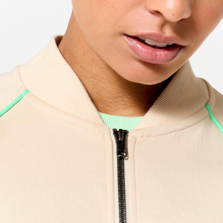 Image du produit Domyos Veste bombers zipée femme, beige avec piping vert. (XL)