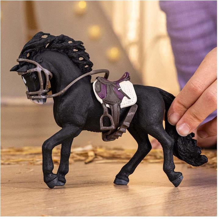 Actual product image Schleich Pura Raza Espanola stallion with saddle and bridle