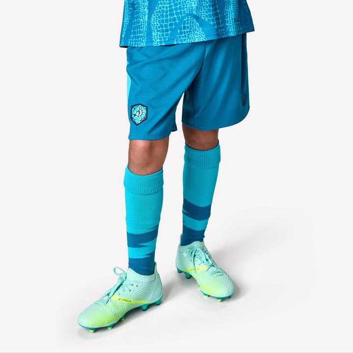 Actual product image Kipsta Kinder Fussball Shorts - VIRALTO Kids türkis mit grünem Streifen (122)