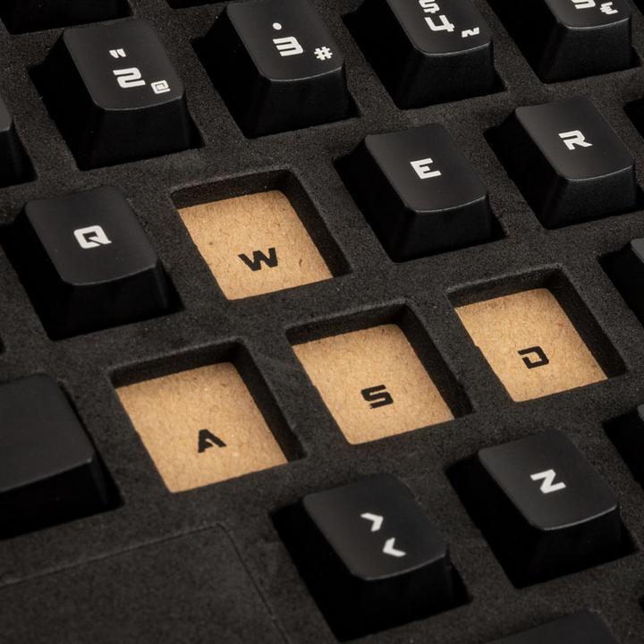 Immagine prodotto Das Keyboard Set di portachiavi dell'agenzia di spionaggio trasparenti, neri e con scritte a laser - Spagnolo