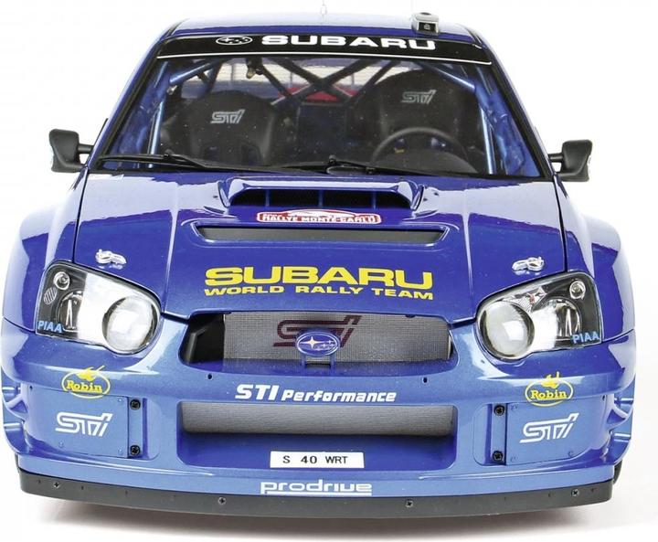 Produktbild Carson 1:8 IXO Subaru Impreza Rally MC 2003