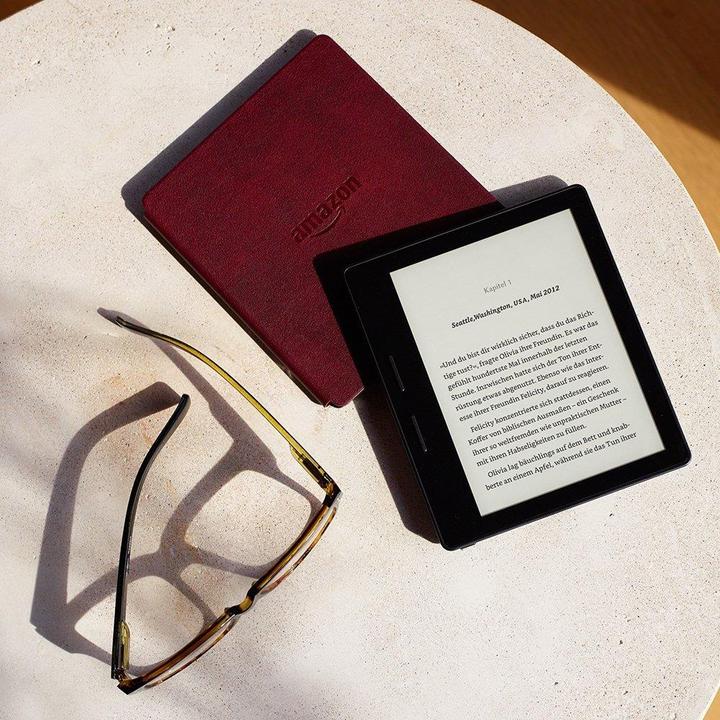 Produktbild Amazon Kindle Oasis + Ladehülle aus Leder (6", 4 GB, Bordeaux)