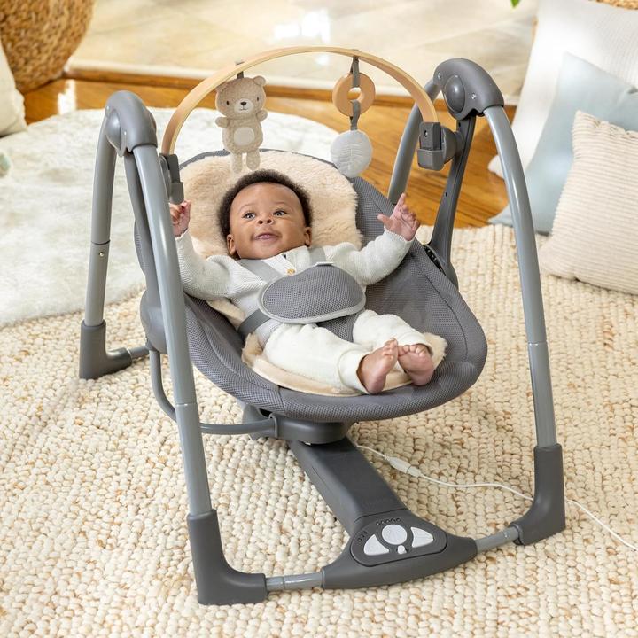 Produktbild Ingenuity Babyschaukel & Wippe mit Musik und Spielbogen