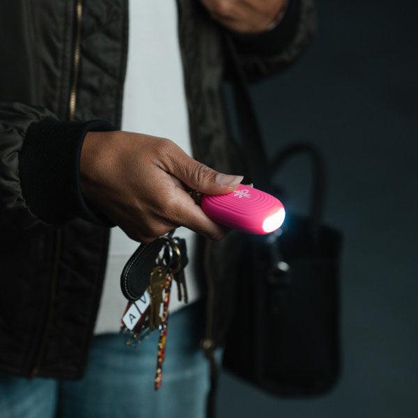 Immagine prodotto Sabre Schrillalarm 2-in-1 Personal Alarm mit LED Licht & Karabinerhaken, pink
