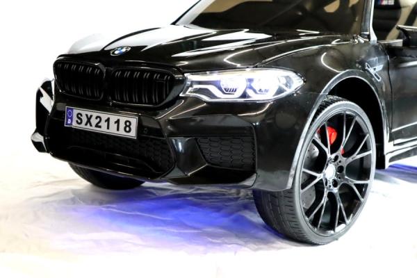 Immagine prodotto Es-toys Veicolo elettrico per bambini "BMW M5" - Licenza - Batteria 12V7A, 2 motori MP3, sedile in pelle + (12 V)
