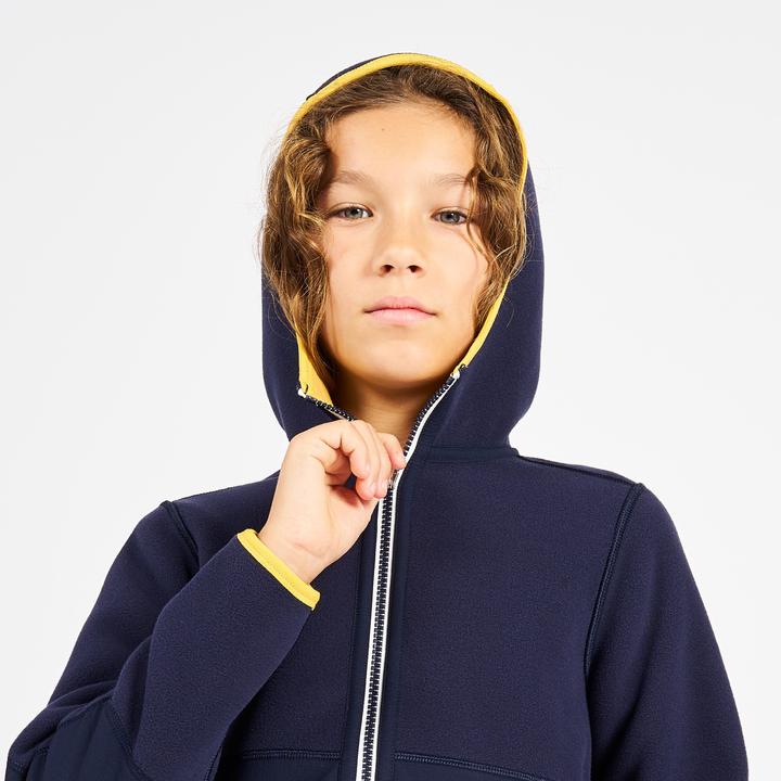 Immagine prodotto Tribord Giacca in pile da vela per bambini calda e reversibile 500 blu navy/giallo (164)